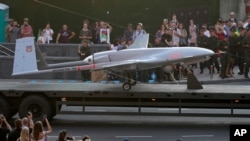 A Turkish-made Bayraktar TB2 drone is seen during a rehearsal of a military parade dedicated to Independence Day in Kyiv, Ukraine, Aug. 20, 2021. 