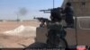 IS May Sustain Virtual Caliphate After Battlefield Losses, Experts Say