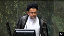 FILE - Iranian Intelligence Minister Mahmoud Alavi answers questions from lawmakers in an open session of parliament in Tehran, Iran, Oct. 25, 2016. 