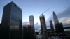 FILE - The Evergrande Group headquarters at left is seen near other skyscrapers and construction sites in Shenzhen in southern China's Guangdong province, Sept. 24, 2021. 