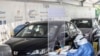 Egyptians get tested for Covid-19 at a drive-through coronavirus-testing center at the Ain Shams University in Cairo, June 29, 2020.