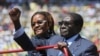 Zimbabwe President Robert Mugabe and his wife, Grace, arrive for his inauguration as president, in Harare, August 22, 2013. 