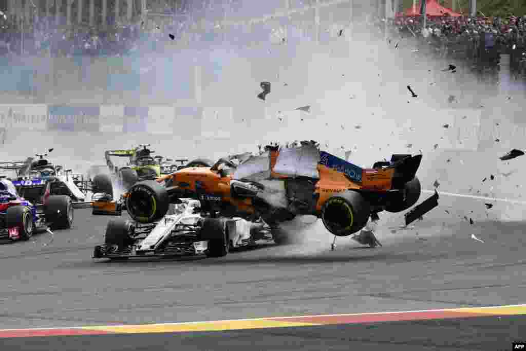 McLaren's Spanish driver Fernando Alonso crashes during the Belgian Formula One Grand Prix at the Spa-Francorchamps circuit in Spa, Belgium, Aug. 26, 2018.