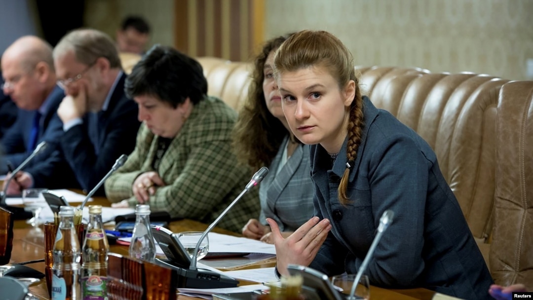 FILE - Public figure Maria Butina (R) attends a meeting of a group of experts, affiliated to the government of Russia, in this undated handout photo obtained by Reuters on July 17, 2018. 