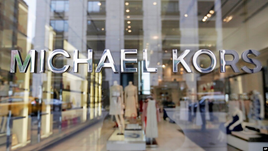 FILE- Michael Kors name adorns his store on Madison Avenue, in New York, May 31, 2017.