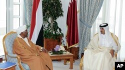 In this handout photo from Qatar News Agency, Sudanese President Omar al-Bashir, center left, meets with with Qatar's ruling emir, Sheikh Tamim bin Hamad Al Thani, in Doha Qatar, Jan. 23, 2019.