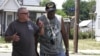 Retirees and Vietnam veterans John Meehan, left, and Art Ledger both want what’s best for their community in West Cleveland, but propose different solutions.