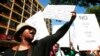 Women protest outside the Pretoria Magistrates court, during the bail application hearing of South African athlete Oscar Pistorius, February 19, 2013.