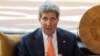 U.S. Secretary of State John Kerry speaks during a meeting with Democratic Republic of Congo Foreign Minister Raymond Tshibanda at N'djili Airport in Kinshasa, May 3, 2014.