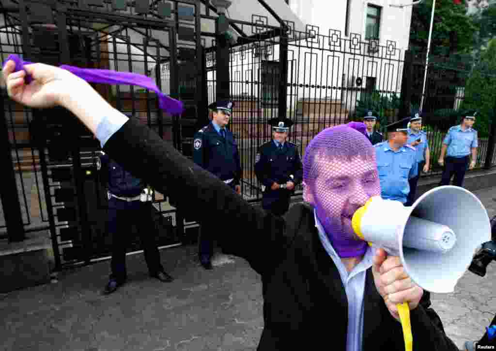 A supporter shouts during a gathering outside the Russian embassy in Kiev.