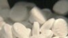 FILE - Aspirin tablets
