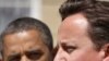Britain's Prime Minister David Cameron (R) speaks during a joint news conference with U.S. President Barack Obama at Lancaster House, in central London, May 25, 2011