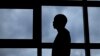 A 26-year-old gay Ugandan man, who insisted on anonymity because of fears for his safety, speaks to The Associated Press, in Nairobi, Kenya, Aug. 7, 2014. 