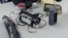 An Improvised Explosive Device (IED) used by the Taliban is displayed during a lesson on identifying IEDs for Afghan policemen conducted by U.S. army soldiers at Camp Nathan Smith in Kandahar, southern Afghanistan, October 15, 2012. 