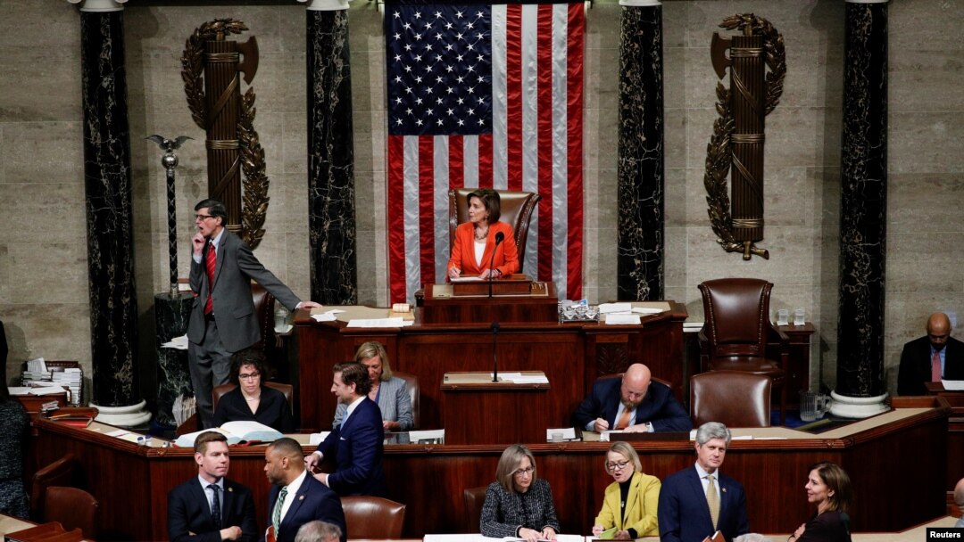 Speaker of the House Nancy Pelosi presides over the U.S. House of Representatives vote on a resolution that sets up the next steps in the impeachment inquiry of U.S. President Donald Trump on Capitol Hill in Washington, D.C.
