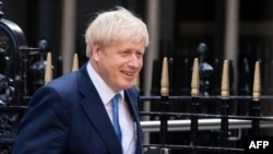 New Conservative Party leader and incoming prime minister Boris Johnson leaves the Conservative party headquarters in central London on July 23, 2019.