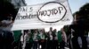 Algerian demonstrators take to the streets in the capital Algiers to protest against the government, in Algeria, Nov. 1, 2019. 