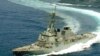FILE - The Arleigh Burke class destroyer USS Russell is shown in the Gulf of Oman.