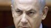 Israeli Prime Minister Benjamin Netanyahu, attends the weekly cabinet meeting in Jerusalem, November 13, 2011.
