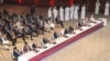 FILE - Abdullah Abdullah, center, chairman of Afghanistan's High Council for National Reconciliation, talks at the opening session of the peace talks between the Afghan government and the Taliban in Doha, Qatar, Sept. 12, 2020. 