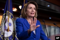 FILE - House Speaker Nancy Pelosi talks to reporters during a news conference at the Capitol in Washington, Jan. 31, 2019.