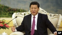 中國國家副主席習近平8月29日在北京人民大會堂會見埃及總統穆爾西時所攝
