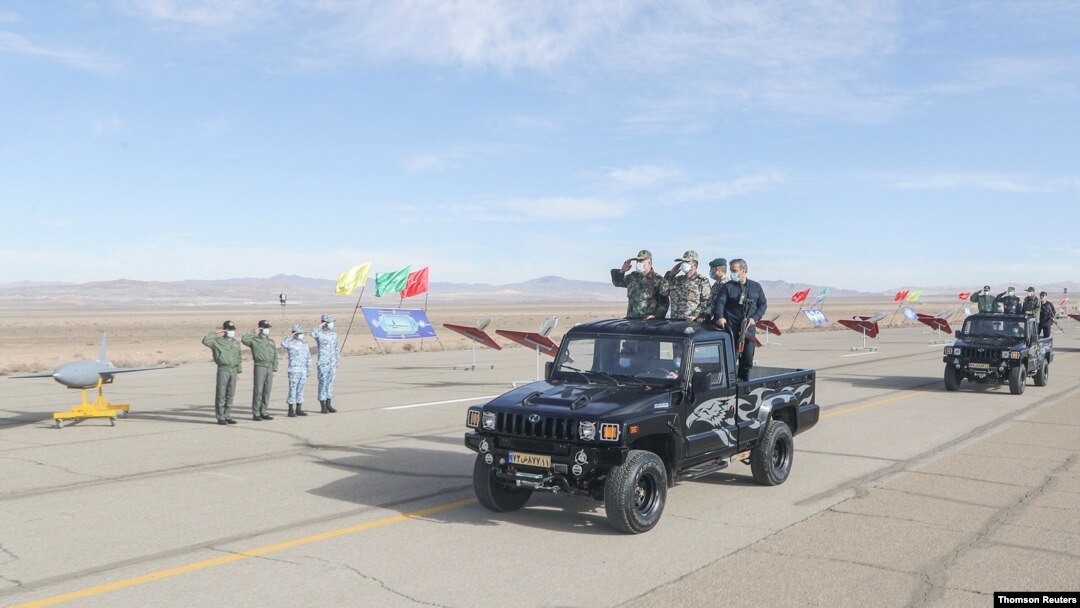 Iranian Armed Forces Chief of Staff Major General Mohammad Bagheri and other top commanders inspect drones as they are prepared for large-scale drone combat exercise of Army of the Islamic Republic of Iran, in Semnan, Jan 5, 2021.