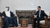 A file handout photo released on Jan. 13, 2009 shows Syrian President Bashar al-Assad, right, meeting with Abu Dhabi's Crown Prince Sheikh Mohammed Ben Zayed in Damascus. 