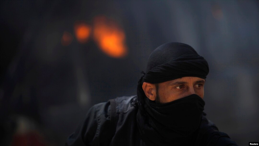 FILE - A fighter from the Islamist Syrian rebel group Nusra Front.