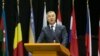 FILE - Montenegro's Prime Minister Milo Djukanovic speaks at the NATO Parliamentary Assembly Spring session in Tirana, May 30, 2016, expressing gratitude for his country's invitation to become an alliance member. 