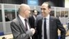 Jorg Asmussen, left, European Central Bank Executive Board member, and Cyprus Finance Minister Harris Georgiades in Dublin Castle, Ireland, April 12, 2013.