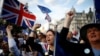 Anti-Brexit protesters demonstrate outside the Houses of Parliament in London, Sept. 4, 2019.