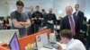 FILE - Russian President Vladimir Putin, right, visits the country's largest internet search engine Yandex headquarters in Moscow, Sept. 21, 2017.