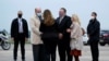 U.S. Secretary of State Mike Pompeo and his wife Susan Pompeo speak with Jacques Jouslin de Noray of the French Foriegn Ministry and U.S. Ambassador to France Jamie McCourt, after arriving at Paris-Le Bourget Airport, in Le Bourget, France, Nov. 14, 2020.