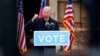 President-elect Joe Biden speaks at a drive-in rally for Georgia Democratic candidates for U.S. Senate Raphael Warnock and Jon Ossoff, in Atlanta, Dec. 15, 2020.