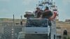 Syrian civilians flee a conflict zone in Syria's rebel-held northwestern region of Idlib, where government bombardment has killed hundreds since late April, near Maar Shurin on the outskirts of Maaret al-Numan, Aug. 22, 2019.