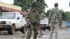 FILE - An armed Burundian soldier is seen on patrol on a street in Bujumbura, Burundi, Nov. 8, 2015. 