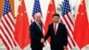 Chinese President Xi Jinping shakes hands with U.S. Vice President Joe Biden (L) inside the Great Hall of the People in Beijing, Dec. 4, 2013.