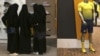 FILE - Saudi women shop at a mall in Riyadh, Saudi Arabia, Dec. 11, 2015. 