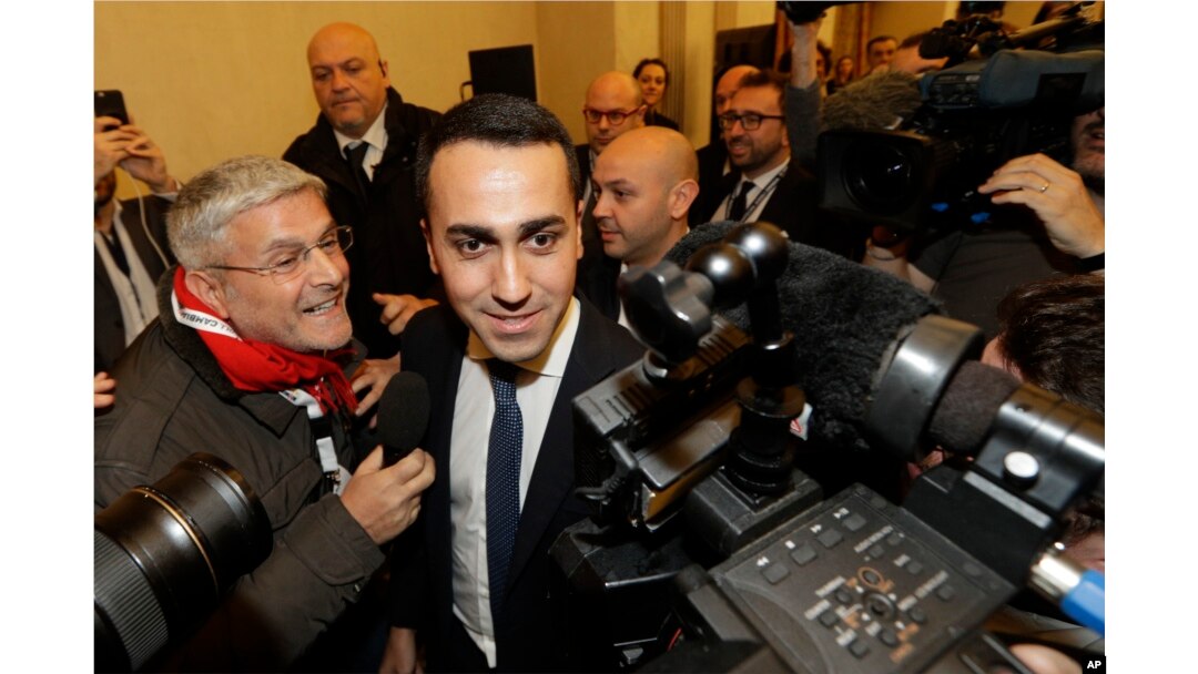 FILE - 5-Star Movement's leader Luigi Di Maio arrives for a press conference on the preliminary election results, in Rome, March 5, 2018.