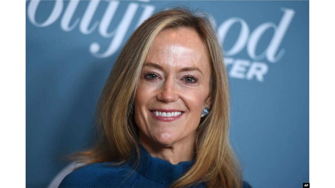 FILE - Karey Burke arrives at The Hollywood Reporter's Women in Entertainment Breakfast at Milk Studios in Los Angeles, Dec. 5, 2018.