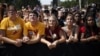 Supporters listen to President Barack Obama at a campaign event at Iowa State University, Ames, Iowa, Aug. 28, 2012.