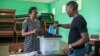 Early reports say a majority of voters in Gabon cast ballots to end military rule