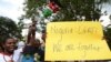 FILE - Kenyan gay and lesbian organisations demonstrate outside the Nigerian High Commission in Nairobi on February 7, 2014. 