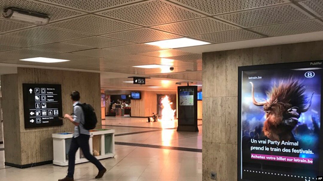 A man blows up an explosive device in the station in Brussels, Belgium, June 20, 2017. The man was shot by soldiers afterwards in what prosecutors are treating as a "terrorist attack." 