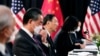 中共政治局委員楊潔篪（中）和中國外長王毅在阿拉斯加美中高層會談上。 （2021年3月18日）