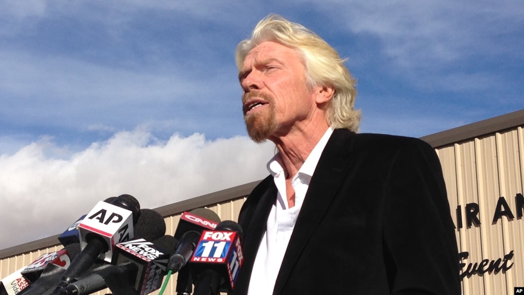 Virgin Galactic founder Richard Branson, speaking to reporters in Mojave, Calif., salutes the bravery of pilots who were testing his spacecraft, Nov. 1, 2014.