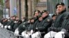 German police officers guard the Deutsche Bank building during a demonstration by anti-capitalism Blockupy protesters in front of the European Central Bank in Frankfurt, May 31, 2013.