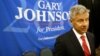 FILE - Libertarian presidential candidate Gary Johnson speaks to supporters and delegates at the National Libertarian Party Convention, in Orlando, Fla.