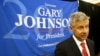 FILE - Libertarian presidential candidate Gary Johnson speaks to supporters and delegates at the National Libertarian Party Convention, in Orlando, Fla.
